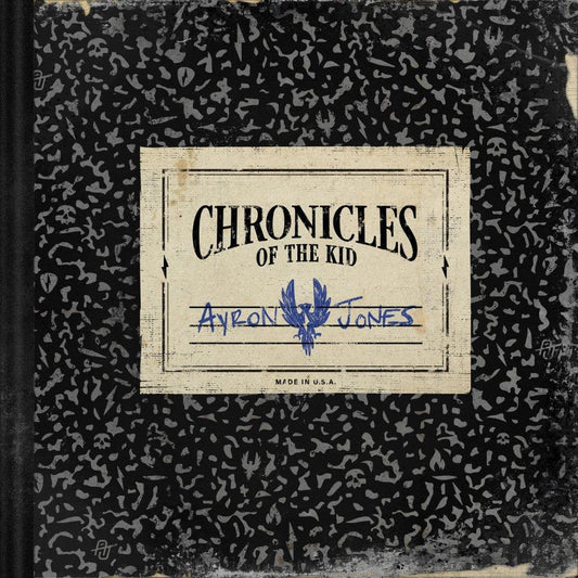 "Album cover with black background, grey patterns, and a vintage label featuring 'Chronicles of the Kid'."