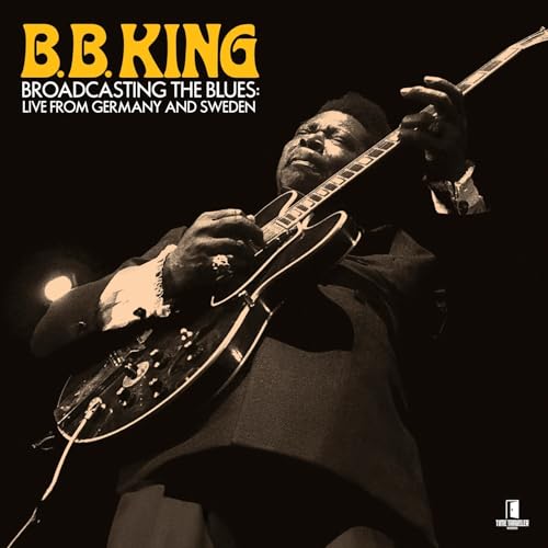 B.B. King playing a guitar, album cover with sepia tone and text.