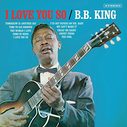 B.B. King playing a sunburst guitar on album cover, turquoise background.
