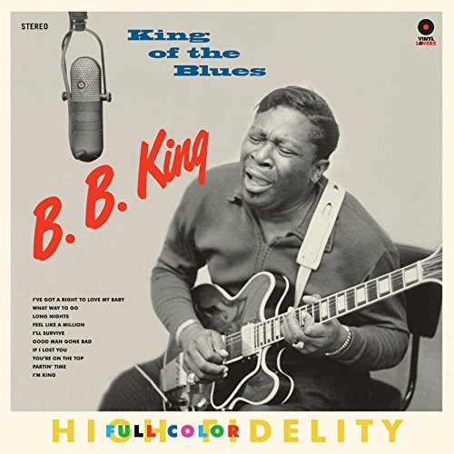 B.B. King playing guitar with a microphone on the King of the Blues cover.