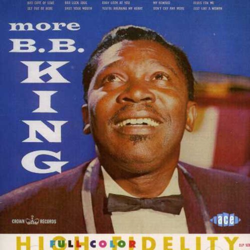 B.B. King album cover with man in suit against blue background.
