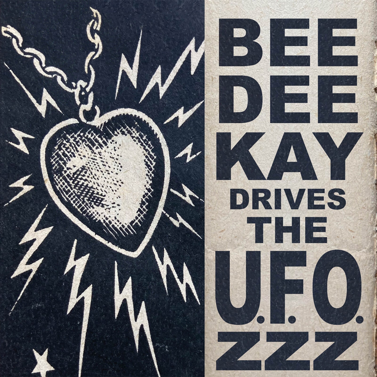 Record cover with a heart-shaped UFO, lightning bolts, and bold text.
