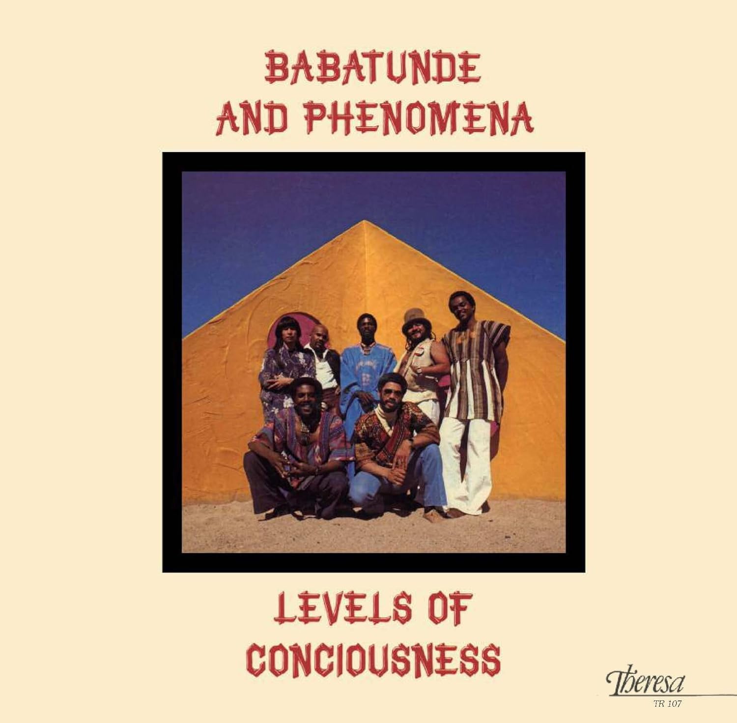 Vinyl album cover featuring a group of people in a desert landscape.