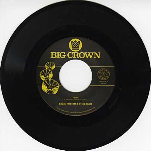 Black 7-inch vinyl record with yellow label, centered hole, and text.