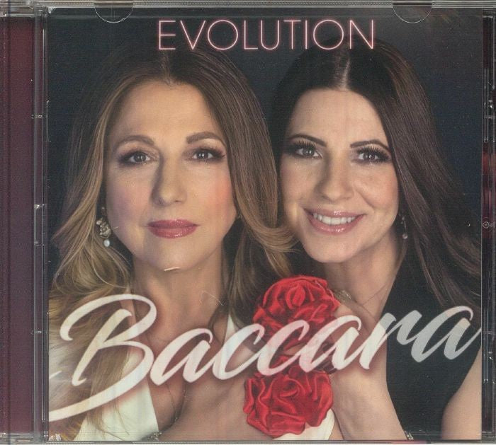 CD cover for “Evolution” featuring portraits of two smiling women.