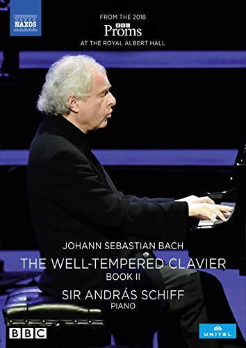 Sir András Schiff playing the piano on the cover of a Bach DVD.