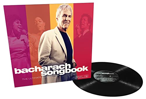 Burt Bacharach album cover and black vinyl record on white background.