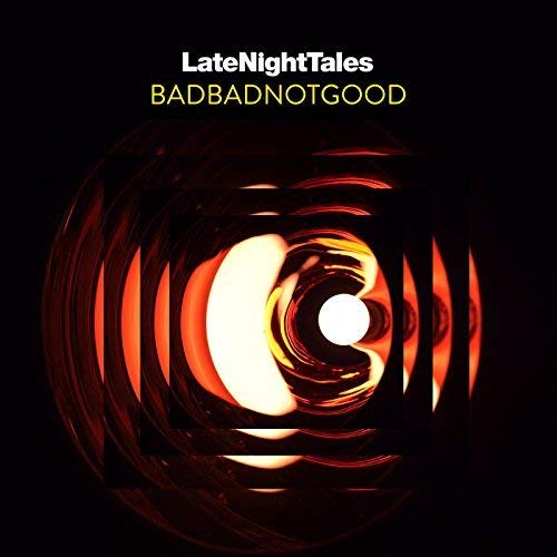 Album cover with text LateNightTales BADBADNOTGOOD over an abstract glowing orange circular light pattern.
