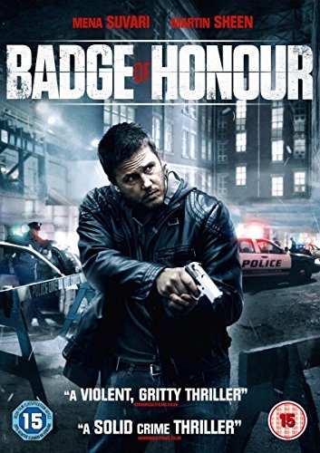 A man in a leather jacket holds a handgun in a dark city street.