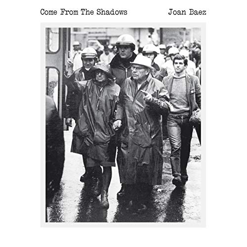 Black and white photo of police escorting protestors, album cover.