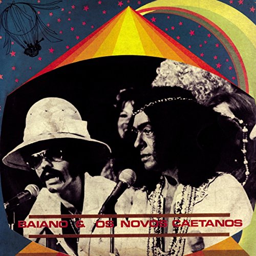 "Vinyl record cover with two men singing into microphones, colorful psychedelic background."