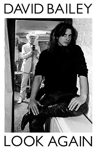 Black and white book cover featuring photographer David Bailey, and his reflection.