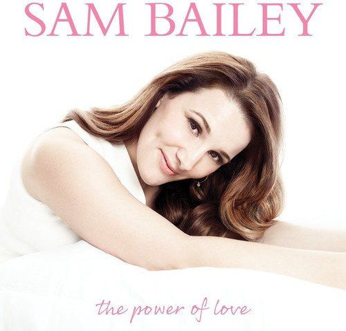 "Album cover featuring Sam Bailey in white, lying down, with pink text on a white background."