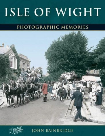 Vintage photo of horse-drawn carriages and people on an Isle of Wight street.