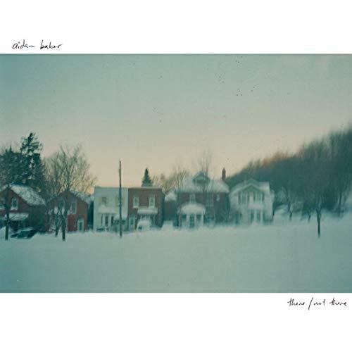 A vinyl record cover featuring a snowy scene with houses and trees.