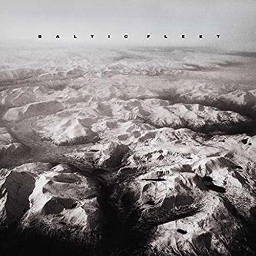 Black and white album cover depicting a mountainous, textured landscape.
