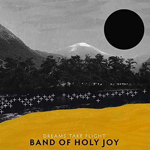 Album cover: mountains, black sun, yellow foreground, text “Dreams Take Flight”.