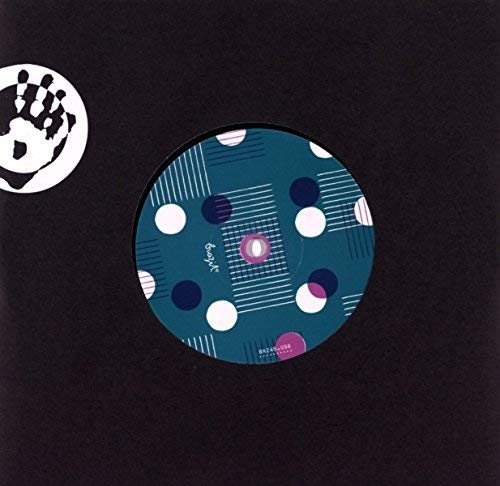Vinyl record label with abstract teal and white polka dot design.