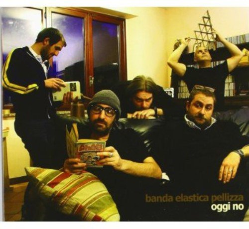 CD cover featuring five men in a casually decorated room.