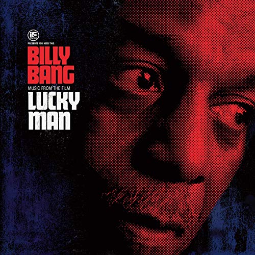 Red halftone portrait of a man’s eye and mouth, album cover art.