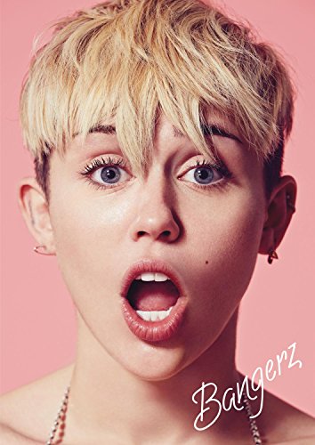 Miley Cyrus with short blonde hair on "Bangerz Tour" DVD cover.