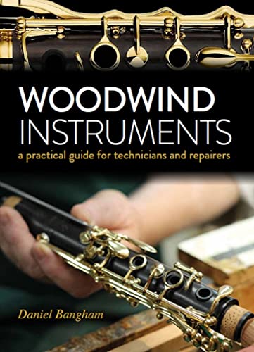 Book cover showing a technician repairing a clarinet with gold-colored keys.
