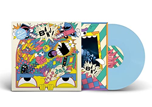 Colorful vinyl record and sleeve with cartoon monster illustration.