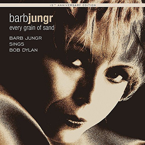 "Album cover with a sepia-toned close-up of a woman's face and artist information."