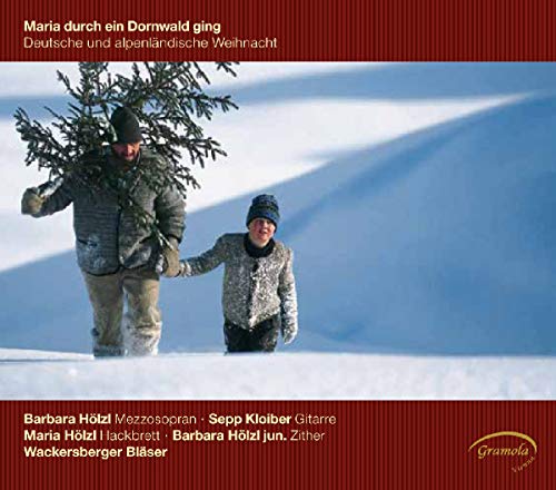 CD cover: father and child walk through a snowy, winter landscape.