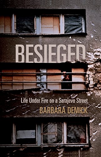Damaged building facade with large text “BESIEGED” and a figure in a window.