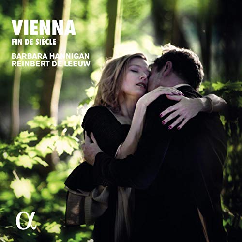 Album cover featuring a couple embracing in a green, wooded setting.