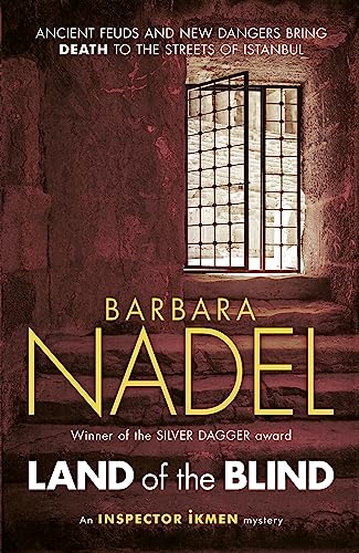 Book cover: crumbling wall with window, title "Land of the Blind" in gold.