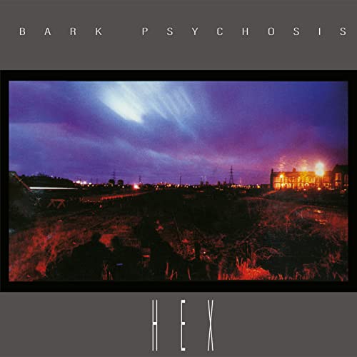 Album cover featuring a nighttime landscape with a purple sky over a dark field.