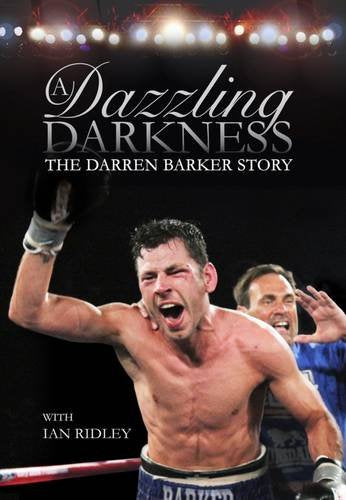 Boxer Darren Barker with raised arm, celebrating victory in a ring.