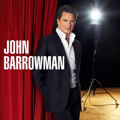 John Barrowman album cover featuring a man in a suit onstage.
