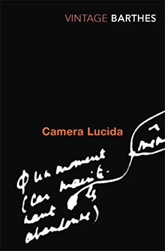 Black book cover with orange text: “Camera Lucida” and sketched handwriting.