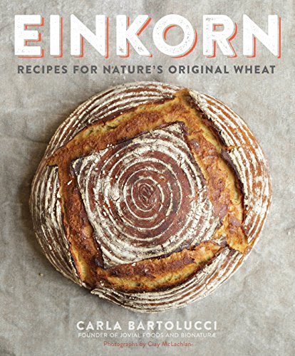 Cookbook cover featuring a round loaf of bread with a square cut-out center.