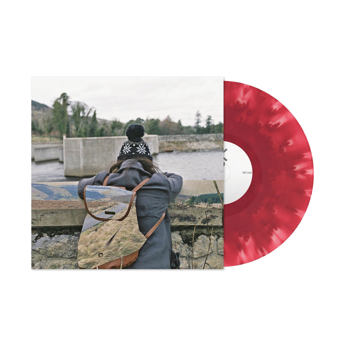 Vinyl record cover: person with backpack looking at a landscape.