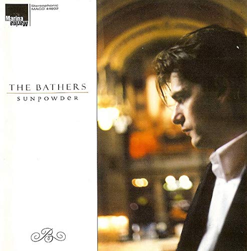 "Album cover with man in suit, white background, and 'The Bathers' text."
