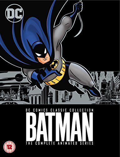 Batman in a dynamic pose on DVD cover art, city skyline below.