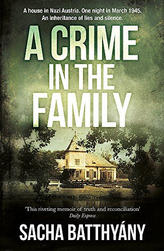 Book cover: "A Crime in the Family" with a house obscured by trees.
