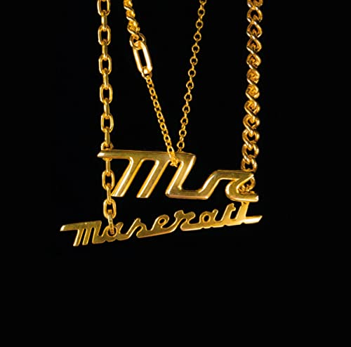 Gold necklaces spelling "Maserati" against a black background.