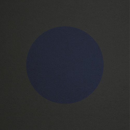 Dark gray square with a centered, solid navy blue circle.