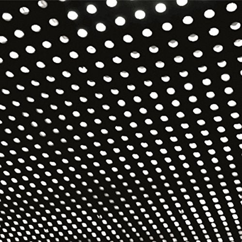 Black and white abstract pattern of numerous small, blurred circles.