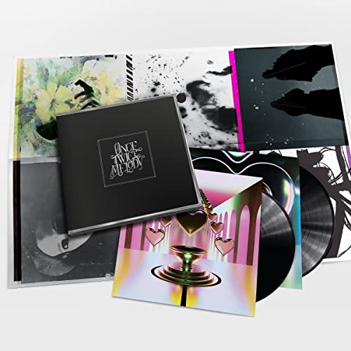 Beach House “Once Twice Melody” vinyl record with colorful album art.