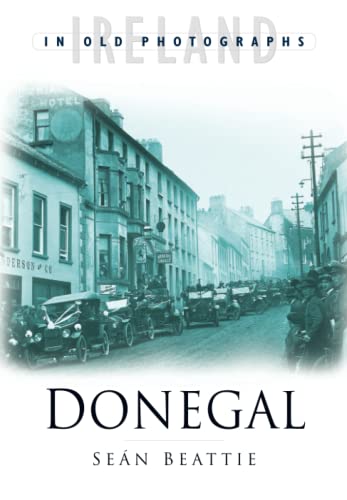Book cover: vintage street scene in Donegal, Ireland, with old cars.