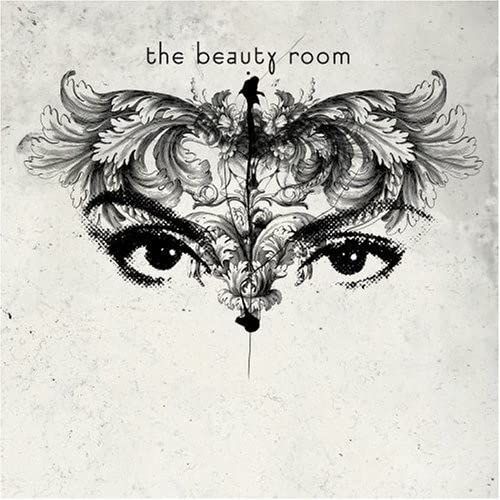 Black and white ornate illustration of eyes and wings, CD cover.