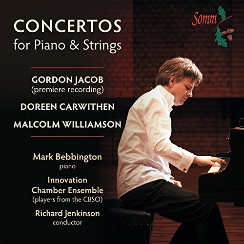 CD cover featuring a pianist at a grand piano, dark background.