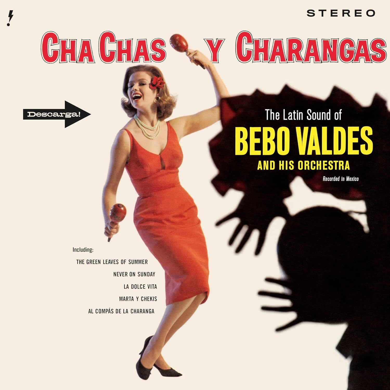 Bebo Valdes album cover: woman in red dress, abstract floral design.