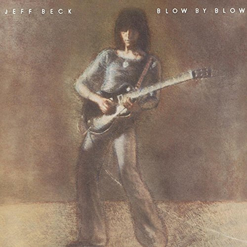 Jeff Beck playing guitar on the album cover "Blow By Blow".